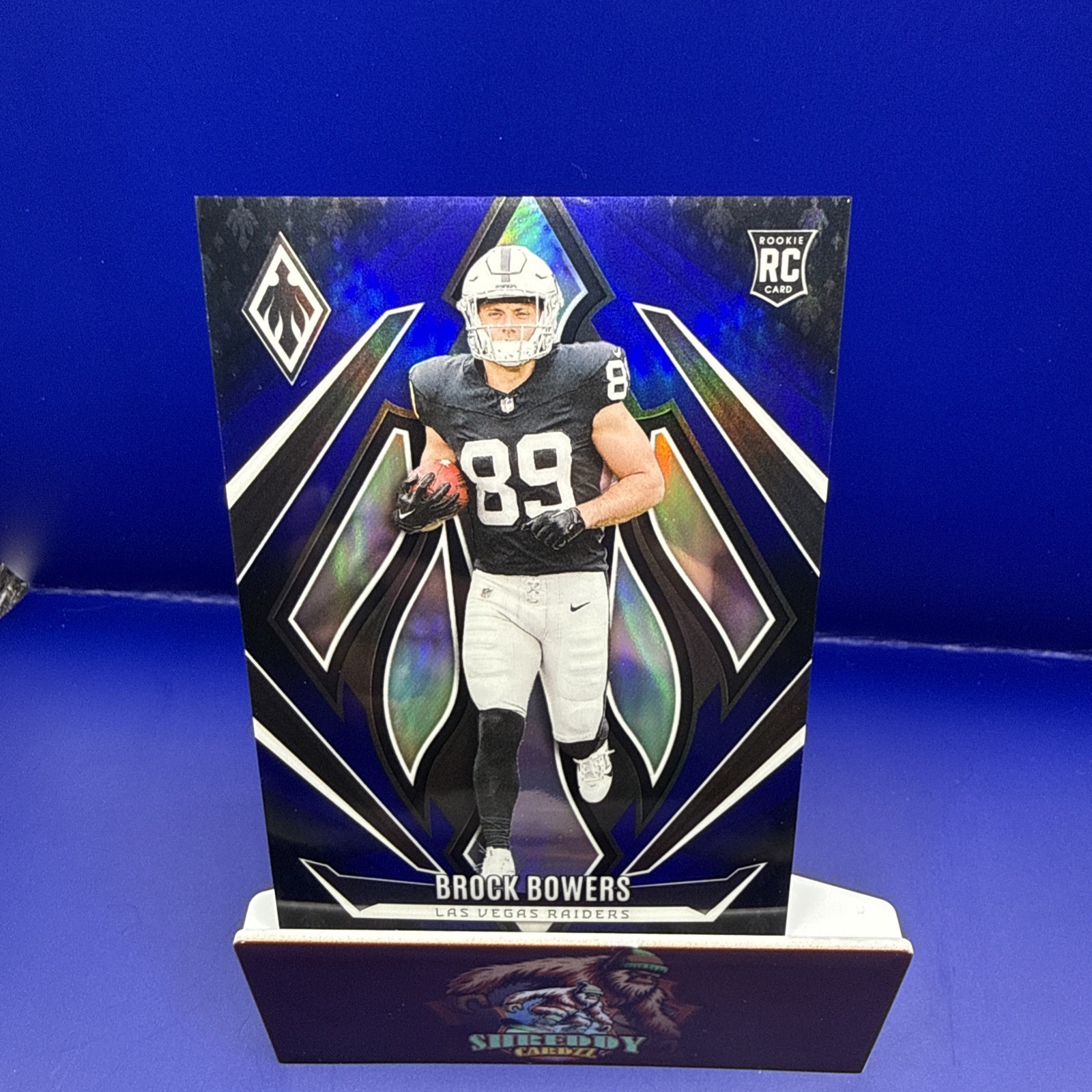 2024 Panini Phoenix - Rookies Brock Bowers #165 Blue Fade 80/249 (RC)💎