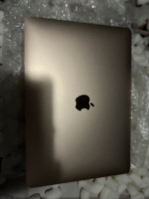 This is an apple mac book in rose gold it's from 2020 and it works