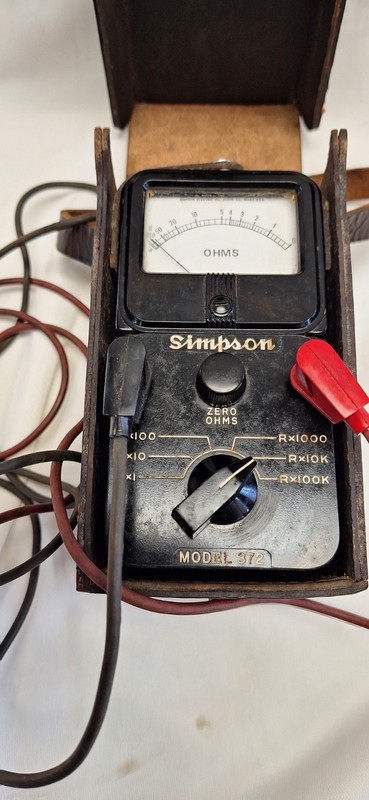 vintage  SIMPSON MODEL 372-2 OHM METER. with leather case. for parts or repaie