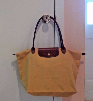 how to fold longchamp bag