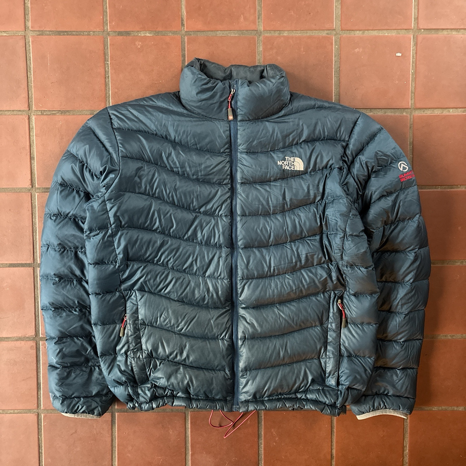 The North Face Summit Series Lightweight Waterproof Down Jacket for Extreme Cold Weather