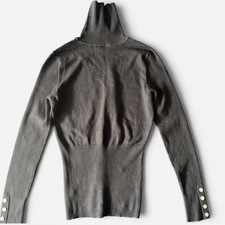 Grey turtleneck sweater with button details