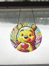 Winnie the Pooh suncatcher. measures 8 inches accross
