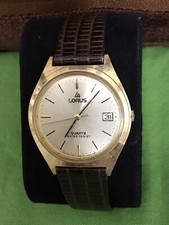Lorus Men's watch. Gold face. Water resistant. Y572-8020 A1
