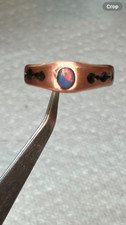  247B- 0.25ct Faceted Ethiopian Welo Opal on a Handcrafted Size 12 Copper Ring
