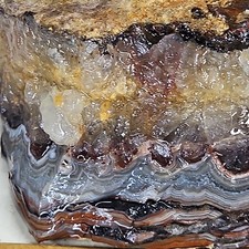 Crazy lace agate rough. Great color crisp banding 1lb 7.6oz.