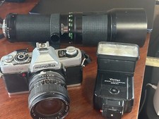 Minolta XG-7camera with lens and Vivitar 440 mm lens and Vivitar zoom thyristor