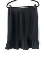 A LOVELY BLACK SKIRT BY BLUMARINE OF ITALY