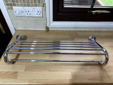 Curved end towel rail in