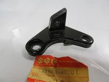 NOS SUZUKI RM100 RM125 RS175 43510-40201 / 43510-40200 - FOOTREST HOLDER RH