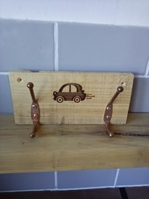 Wall hooks, natural wood backing,  car image, with two hooks.