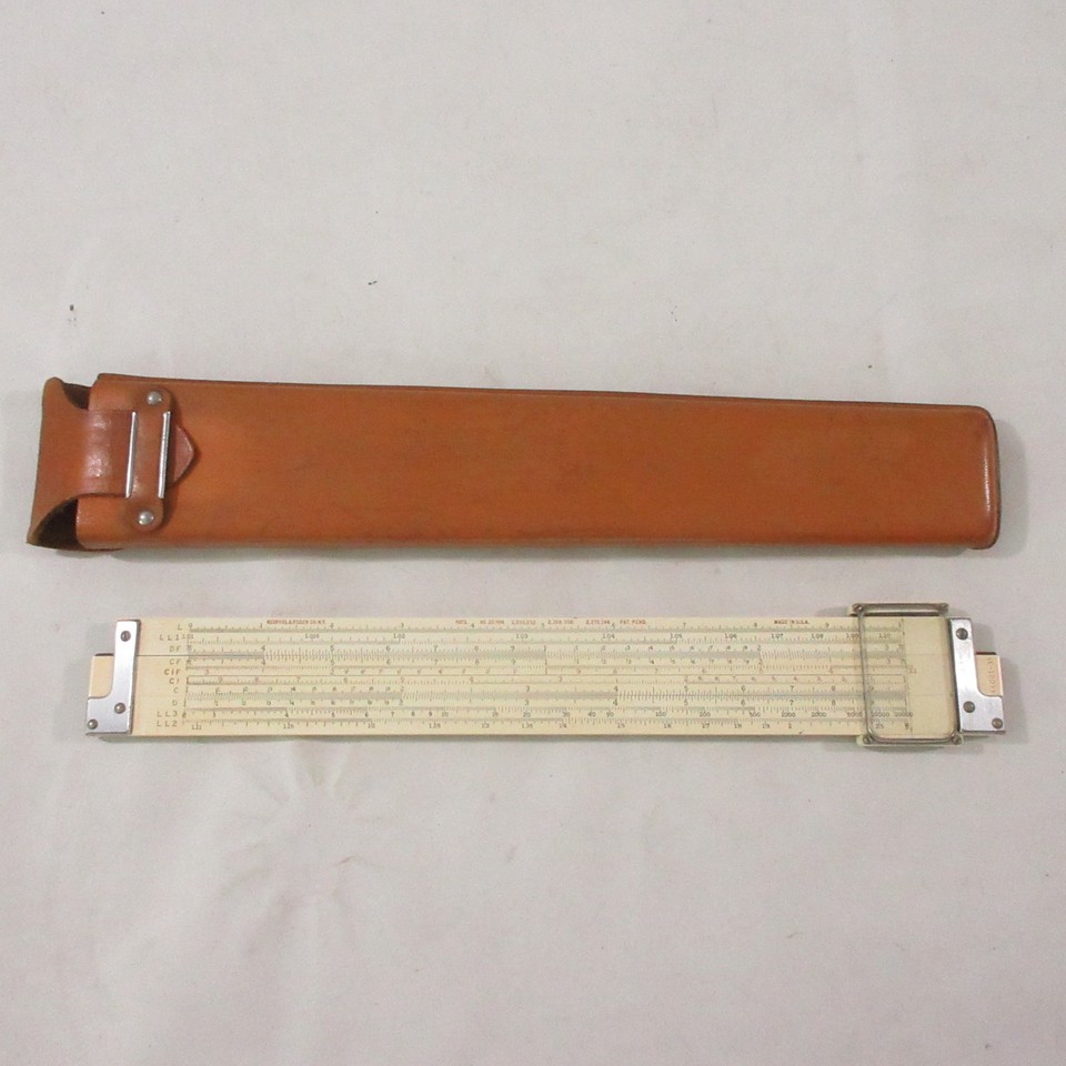 A K&E Keuffel & Esser Log Duplex Dexitrig slide rule in original leather case — the gold standard of American engineering slide rules, used by NASA-era engineers.