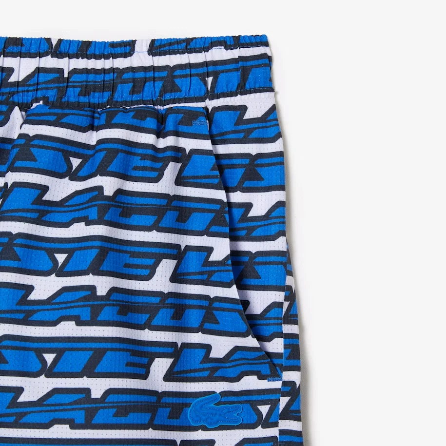 Pantalones cortos de natación de secado rápido con estampado de logotipo de dos tonos Lacoste para hombre Foto 4 de 4