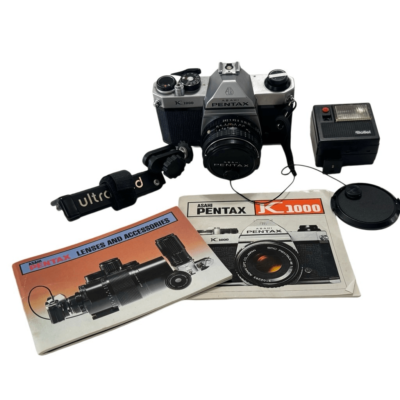 Pentax K1000 35mm SLR Camera w/SMC Pentax-M 50mm f/1.2 Lens, flash