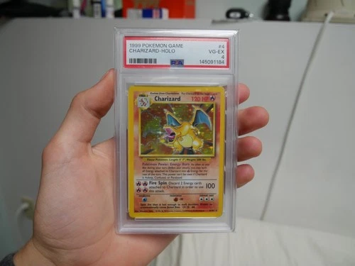 Charizard 004/102 Base Set Holo PSA 4, Great Birthday gift.