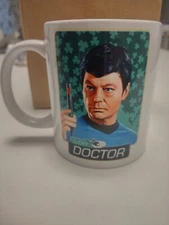 Star Trek 12oz Mug "Lucky Doctor" (i.e. Dr. McCoy) from The Star Trek Shop, NEW