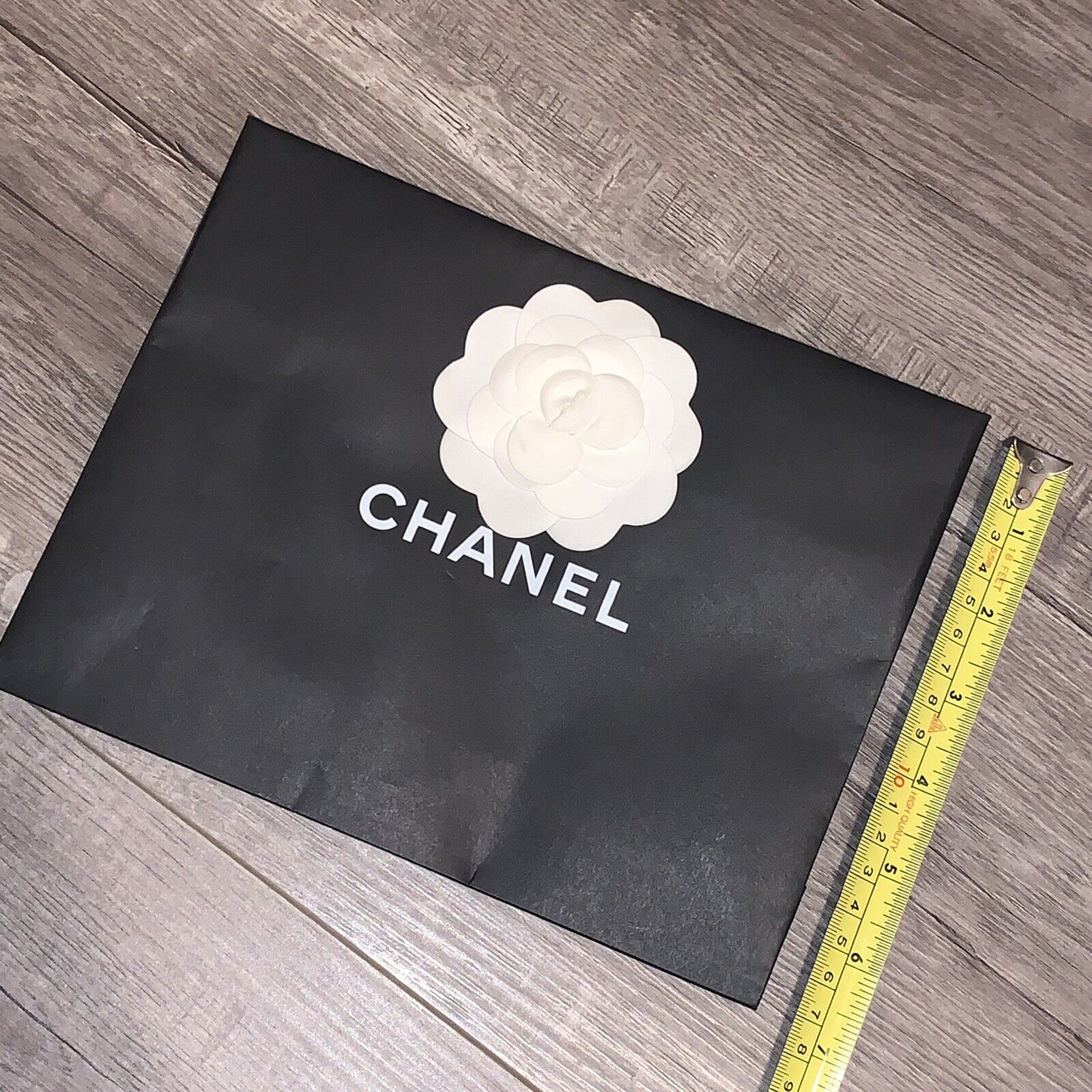 Auth. Chanel paper shopping bag With Flower 9x7x2.5” Size S