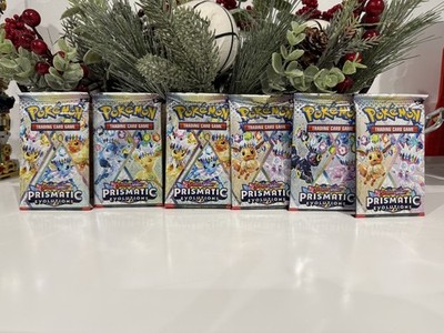 New Pokemon TCG Prismatic Evolution Individual Booster Pack. Randomly Selected.