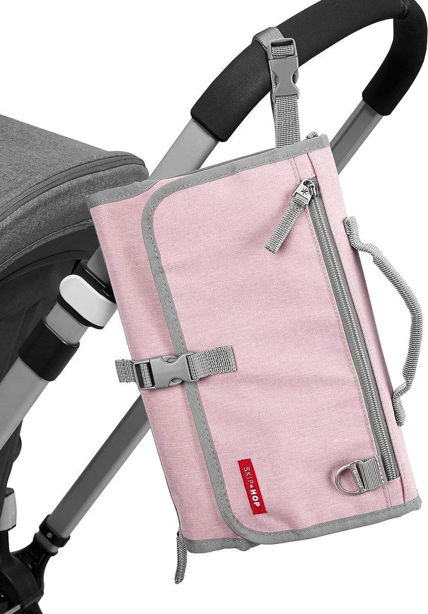 Skip Hop Pronto changing pad in Pink with zipper pockets and wipe