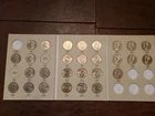 KENNEDY HALF DOLLAR BOOK WITH COINS1985-1986 and 1988-1999 28 COINS