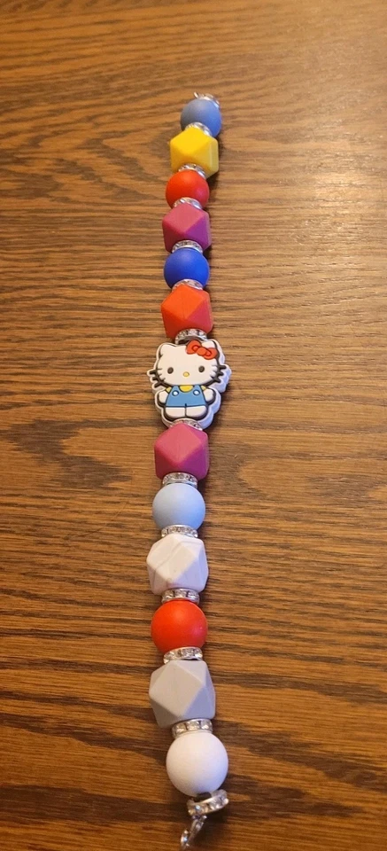 Pulsera de cuentas de silicona Hello Kitty multicolor artesanal de 9,5" con cierre de lóbulo  Foto 2 de 4