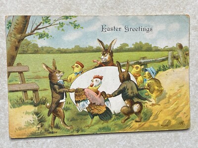 i 1871 Postcard Easter Greetings with animals dancing around a huge egg Embossed