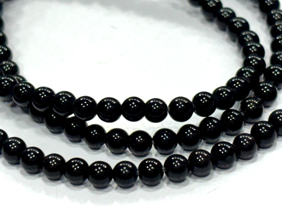 CUENTAS DE PIEDRAS PRECIOSAS REDONDAS LISAS DE ÓNIX NEGRO DE 3-3,5 MM 1 HEBRA 14 PULGADAS Foto 2 de 4