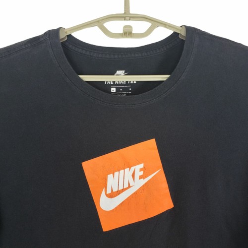 black nike shirt with orange