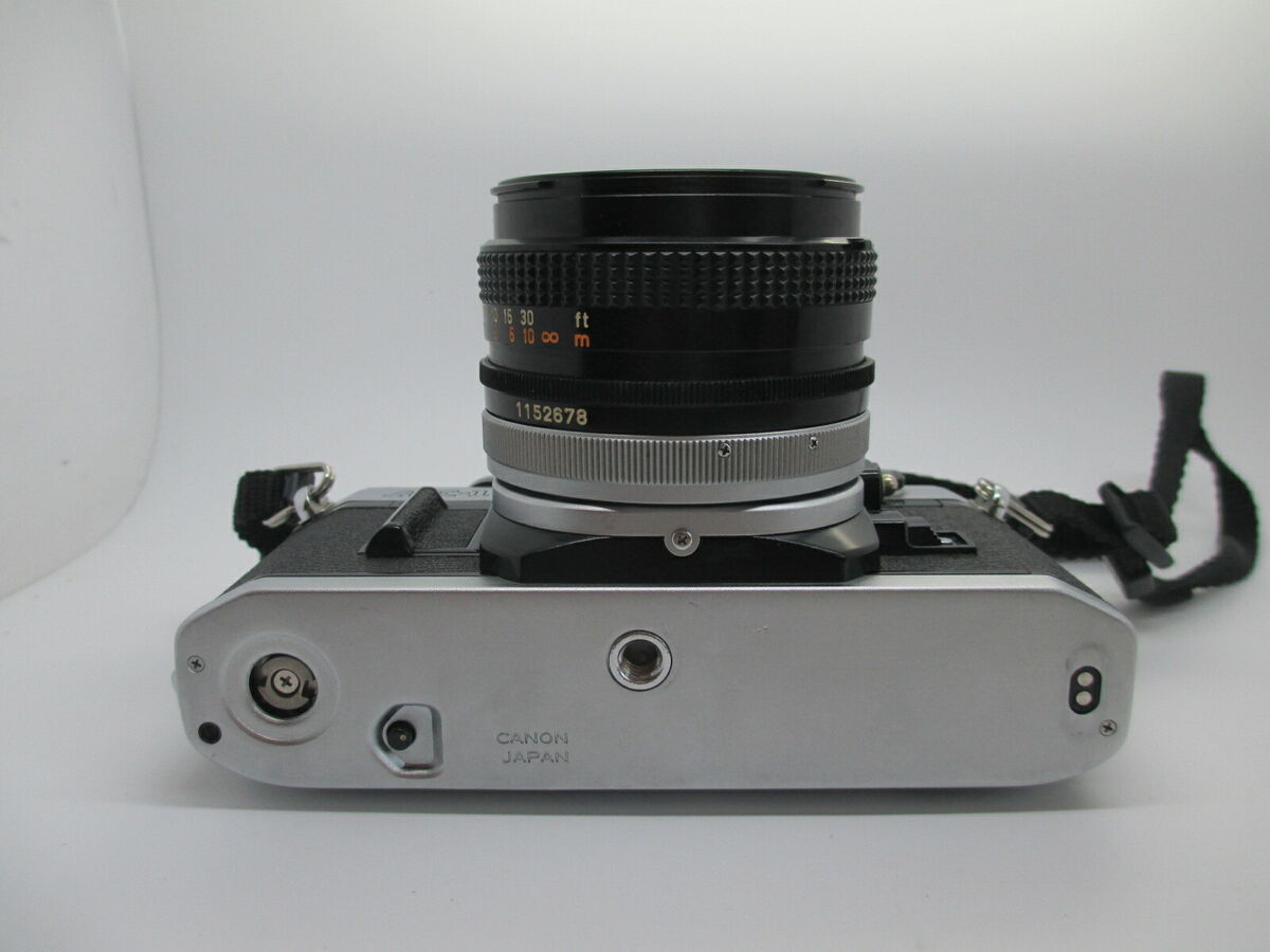 Canon AE-1 35mm SLR Film Camera with Canon 50mm f/1.8 FD Canon AE-1 35mm SLR Film Camera with Canon 50mm f/1.8 FD