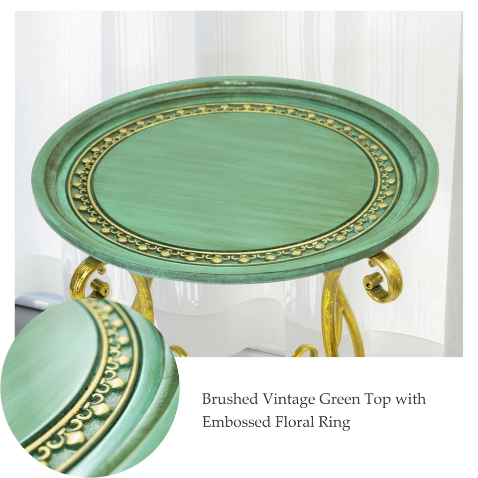 Mesa redonda vintage con tapa verde decorativa y pata de hierro con desplazamiento dorado... Foto 3 de 4