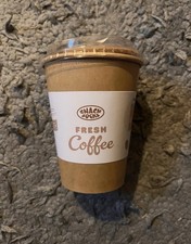 Cotton socks in a coffe cup