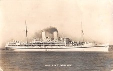 HMT EMPIRE KEN AT SEA ~ MINISTRY OF WAR TRANSPORT DEPT., REAL PHOTO PC used 1953