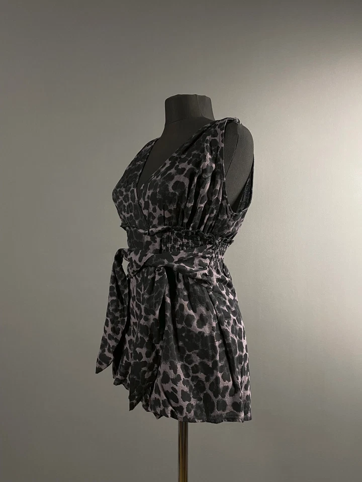 Mono mameluco Free People FP Movement Jog It Off púrpura estampado de leopardo talla XS-S Foto 4 de 4