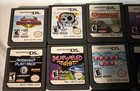 Nintendo DSI XL Midnight Blue Handheld Game Console with 11 games, case &charger — photo 3