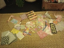 stickers and paper and  glitter pots