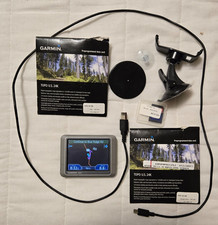 Garmin nuvi 200 GPS navigator with auto mount, chargers, 3 data SDs, manual