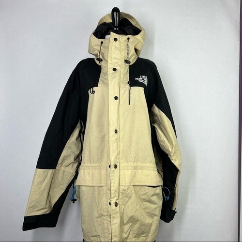 black and cream north face jacket