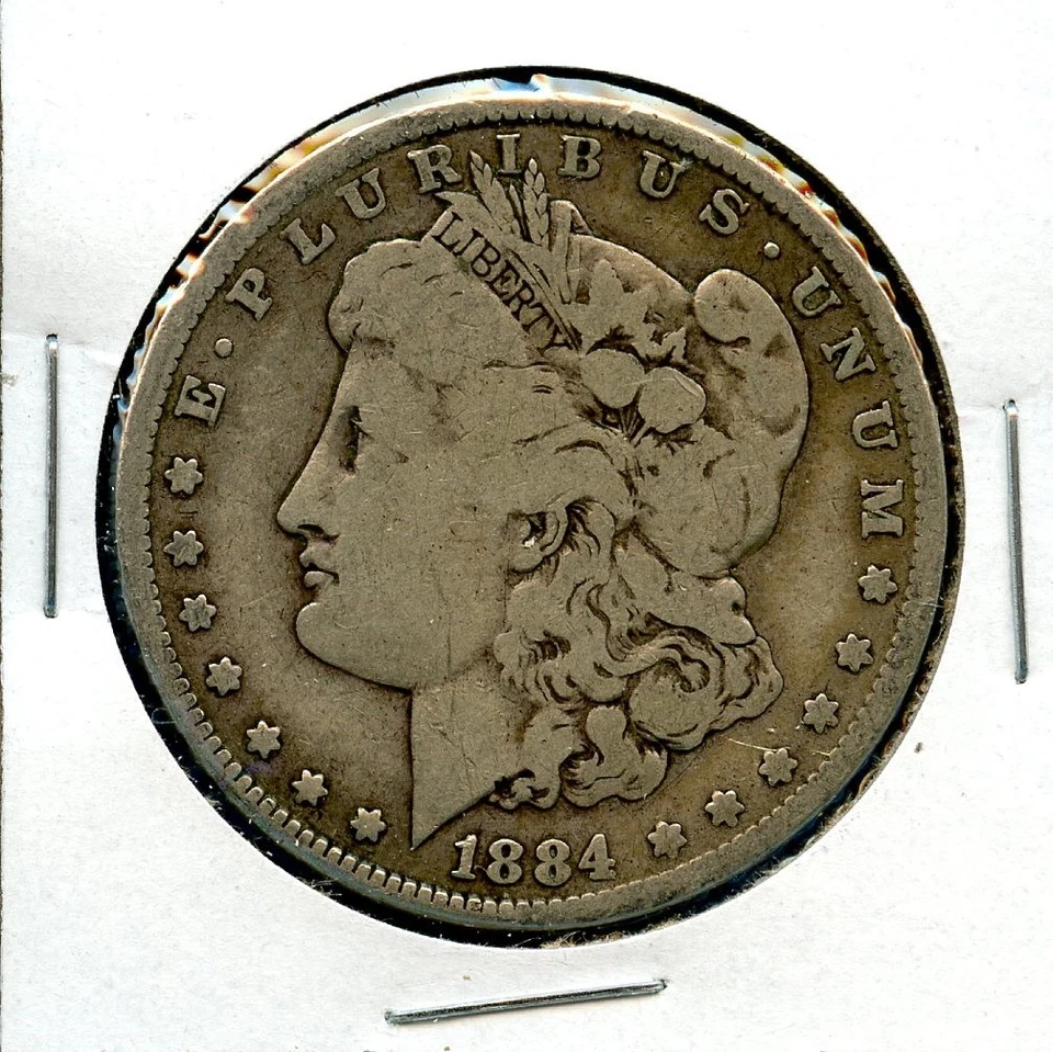 Dólar Morgan 1884 P $1 plata como nuevo 1884-P error inverso planchet defecto grieta Foto 2 de 3