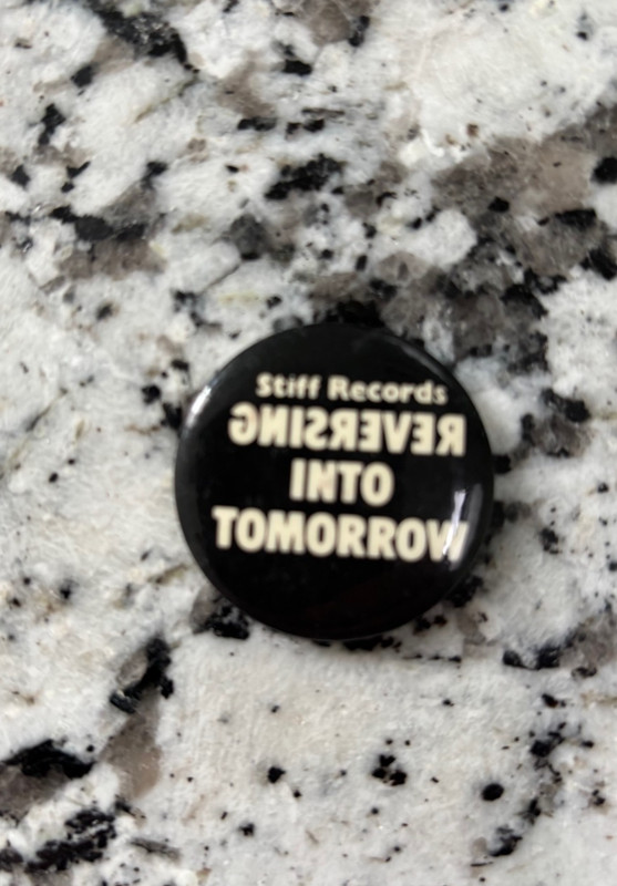 Stiff Records RARE pinback button - (1978) - "Reversing Into Tomorrow"