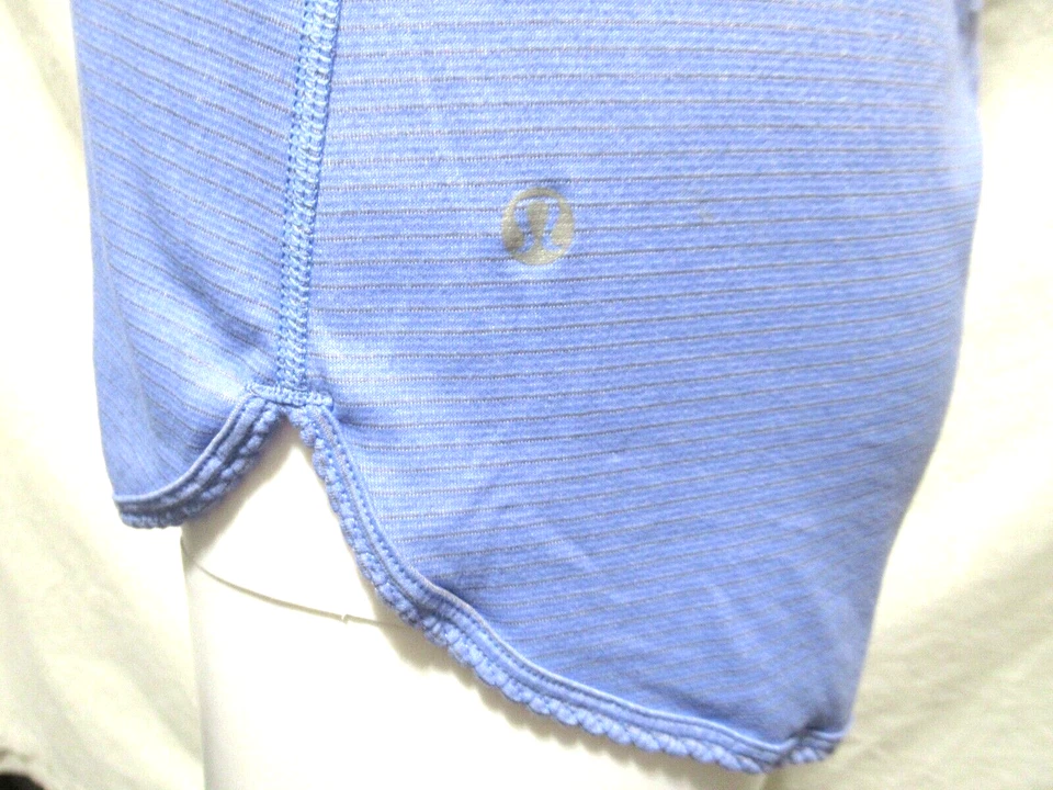 Camiseta sin mangas Lululemon talla 6 púrpura con rayas grises calce relajado espalda de corredor Foto 3 de 4
