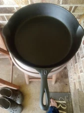lodge cast iron single notch skillet with raised 10 on the handle
