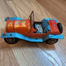 Vintage pressed tin toy car. Made in Japan