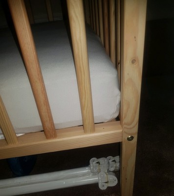space saver cot kiddicare