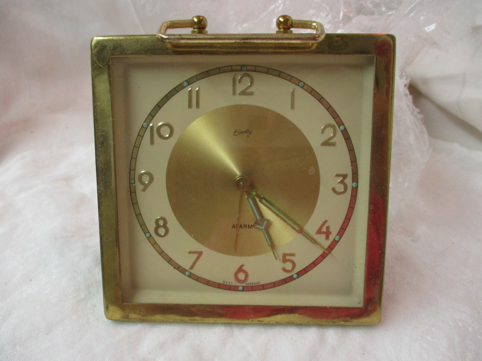 Vintage West Germany brass Bradley Alarm Clock runs illuminated dial