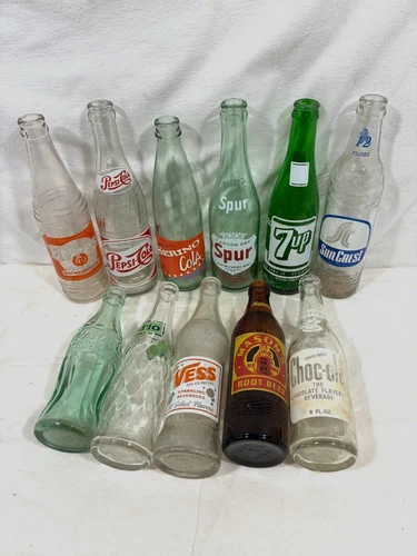 Lot of 11,Vintage Glass Soda Pop Bottles 7up, Pepsi, Coke, Spur, Mason, Serino +