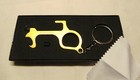 New ZOMBIKK No Touch Tool Door Opener Keychain Rubber tips Brass New In Box