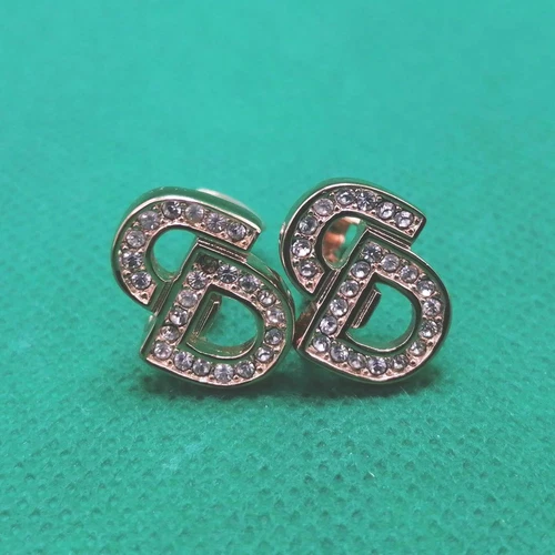 Boucles d'oreilles CHRISTIAN DIOR logo doré du Japon