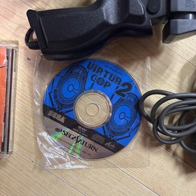 SEGA Saturn + 2 controllers + 3 game software