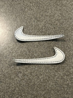 silver nike swoosh