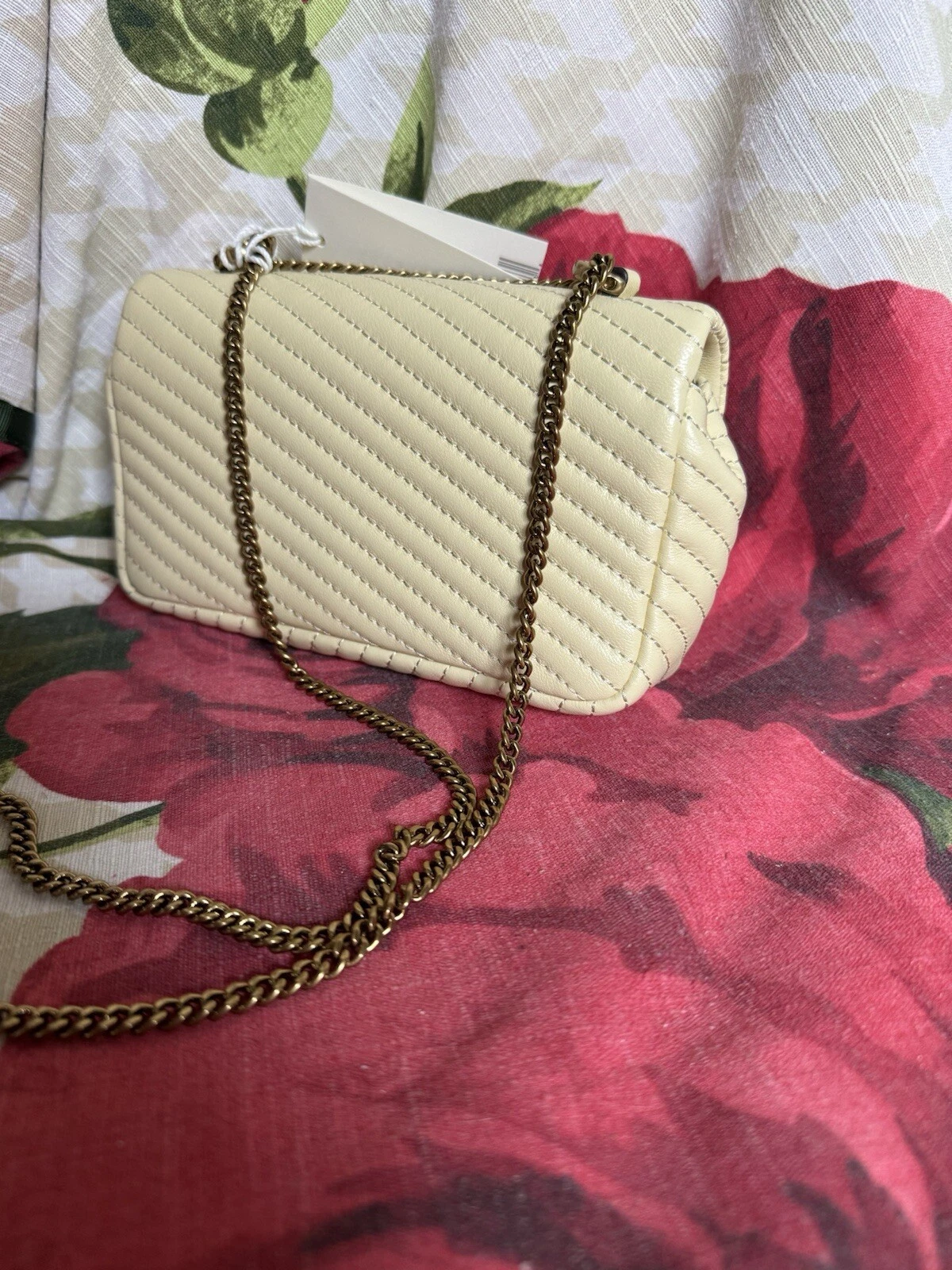 Borsa a tracolla Tory Burch Kira Moto Quilt Mini Flap in pelle con vortice di limone $358